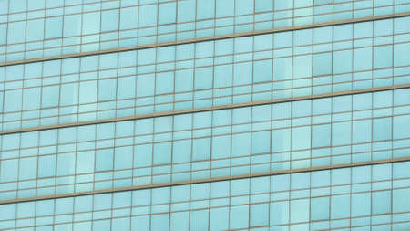Glass wall of business center. May be used as backgroundの写真素材