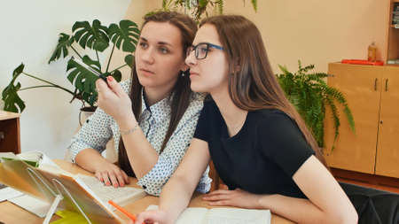 Students study in the classroom at the school deskの写真素材