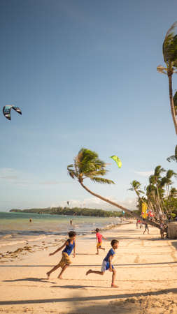 Boracay, Philippines - January 5, 2018: Kiteboarding. People enjoying the energy of the wind on the beach of the island of Boracay. Philippines.のeditorial素材