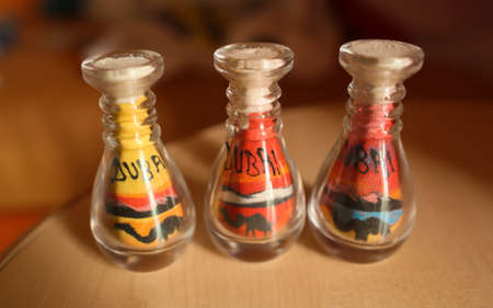 Arabian traditional sand souvenirs. Bottle of sand from Dubai.の写真素材