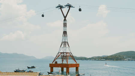 Cable car to Vinpearl amusement park in the morning sunshine to attract tourists to the weekend relaxing in Nha Trang, Vietnamの写真素材