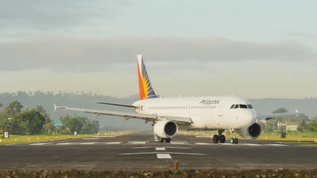 Legazpi, Philippines - January 5, 2018: Aircraft at the airport of the city of Legazpi early in the...