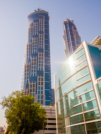 Dubai, UAE - May 15, 2018: Streets with modern skyscrapers of the city of Dubai
