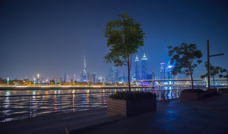 Panorama of skyscrapers of Dubai at night. View of Dubai Greek district.