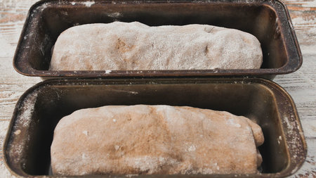 Raw dough in a mold. Baking homemade bread