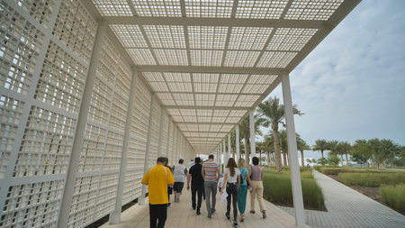 Abu Dhabi, UAE - December 15, 2019: Tourists go to the Louvre Museum near Abu Dhabi.のeditorial素材