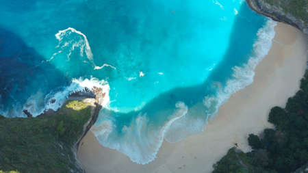 Aerial view Kelingking Beach on Nusa Penida Island, Bali, Indonesiaの写真素材