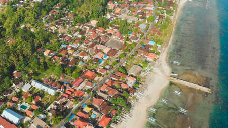 Indonesian Sampalan village on the island of Nusa Penida. View from the height.の写真素材