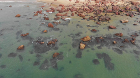 Stony Kalacha beach in Goa. India. Flight of the droneの写真素材