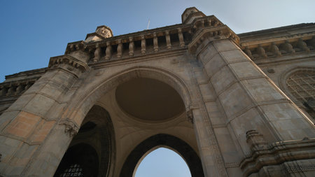 Gate of India in Mumbai against a blue sky
