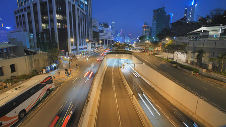 Time lapse of night city car traffic in the evening in Hong Kong.