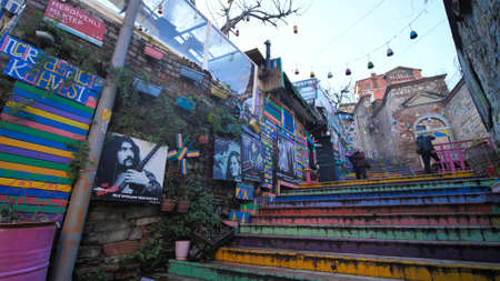 Istanbul, Turkey - January 8, 2020: Stairs painted in various colors located in the historical district of Balat. Tourists and people are visiting this historical place.のeditorial素材