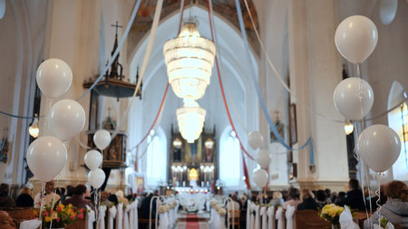 White balls in a Catholic church during a divine service.