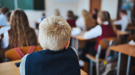 A junior high school class in a middle school. Back view.の写真素材