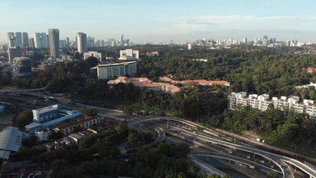 Aerial view of the silhouette of skyscrapers and the city center of Kuala Lumpur.