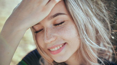 Face close-up of a nice young blonde russian girl.