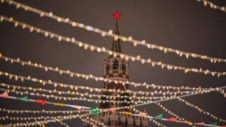 Spasskaya Tower of Moscow Kremlin shining through christmas lights at eveningの写真素材
