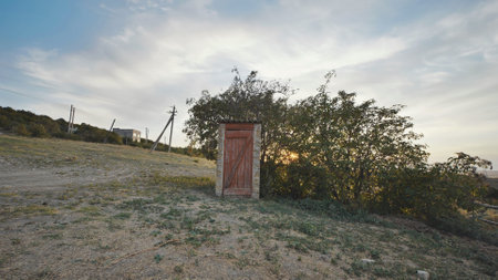Old rural toilet in the steppe near Belogorsk in Crimeaの写真素材