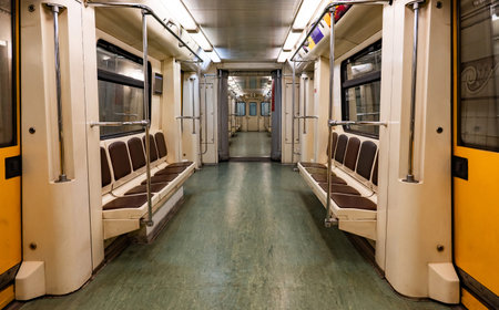 Empty subway car interior connecting passage, public transport and commute concept