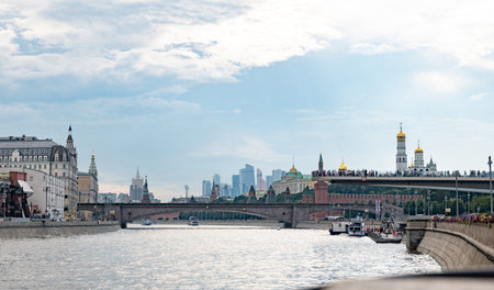 Moscow river with Zaryadye Park, Kremlin, and Moscow City skyline in summer