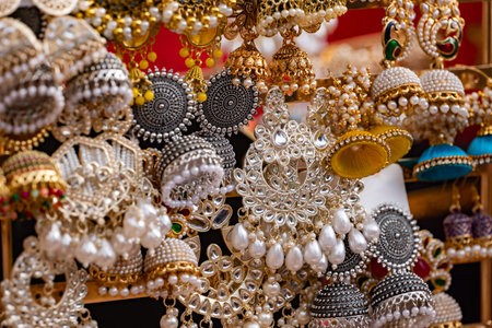 Indian Jhumka style earrings displaying traditional craftsmanship and cultural adornmentの写真素材