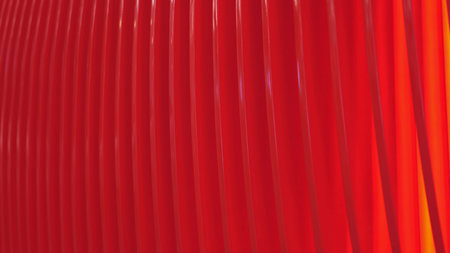 Repeating red curved lines creating modern abstract pattern and textureの写真素材