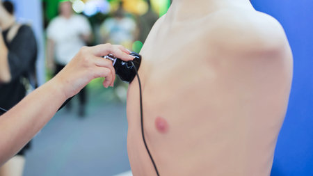 Medical student learning using a training mannequin and electronic stethoscopeの写真素材
