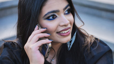 Young Indian woman posing with blue makeup in Moscow