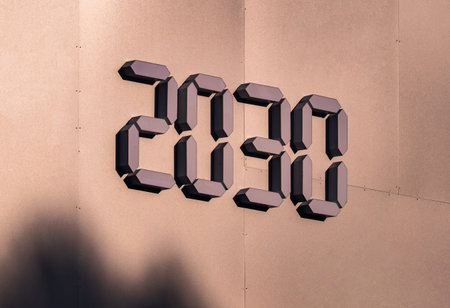 Digital 2030 numbers displaying future vision and global forecast on textured wallの写真素材