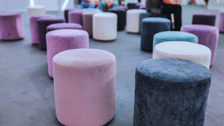 Colorful velvet stools arranging for exhibition seating contemporary design