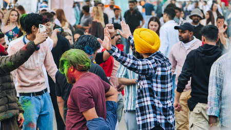 Moscow, Russia - August 25, 2025: Celebrating the Holi festival in Moscow with colorful powder and...
