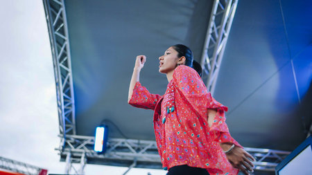 Moscow, Russia - August 25, 2025: Indian woman performing traditional dance on stage at India Day...