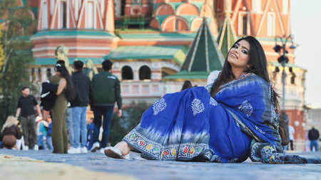 Bangladeshi woman in a beautiful deep blue sari in Red Square, Moscow, Russia