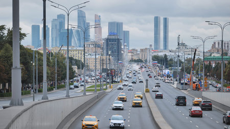 Moscow, Russia - August 17, 2025: Moscow City skyscrapers rising above Kutuzovsky Prospekt with heavy trafficのeditorial素材