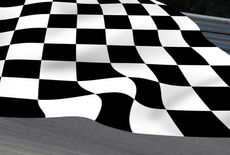 Chequered flag on racetrackの写真素材