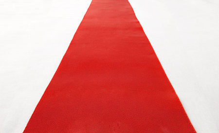 Red carpet   red ribbon on white 
