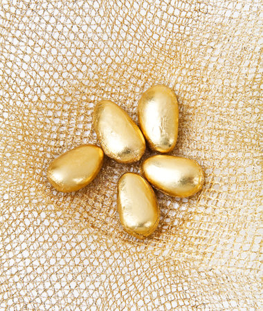 Five golden candies for a weddingの写真素材
