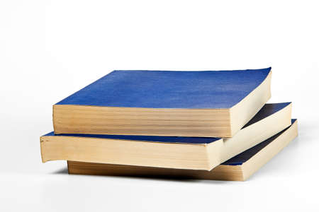 Three blank blue books on whiteの写真素材