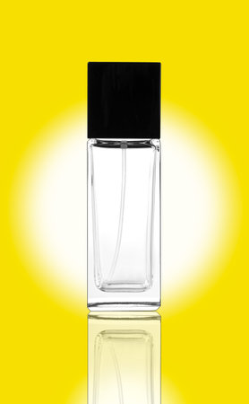 Silhouette of a little bottle on yellow background.の写真素材