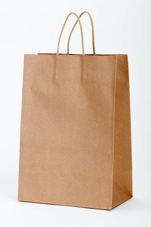 Brown shopping bag on white.