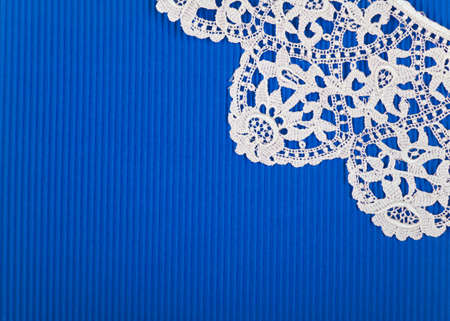 Blue paper with lacy borderの写真素材