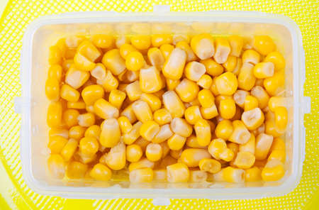 Kernel corn in a plastic containerの写真素材
