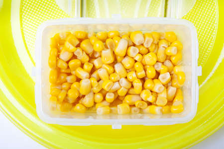Kernel corn in a plastic containerの写真素材