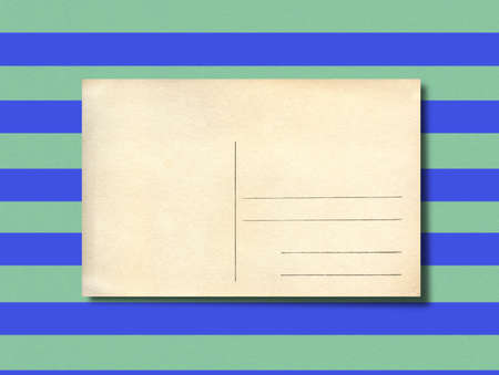 Postcard on green and blue with shadow の写真素材