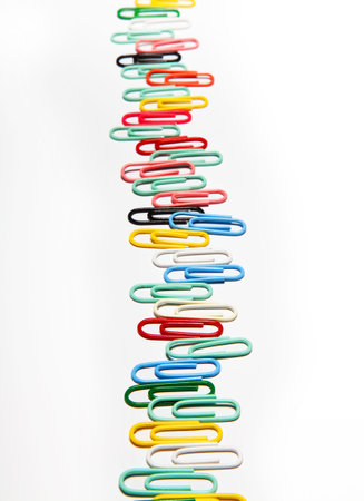 A row of colorful clipsの写真素材
