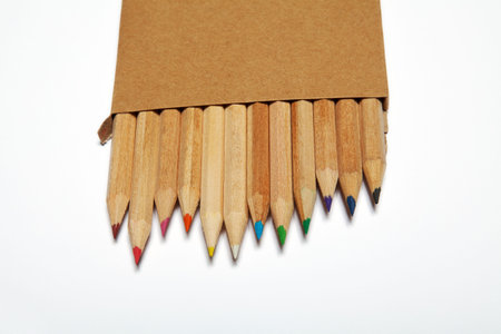 Pencils in a box on whiteの写真素材