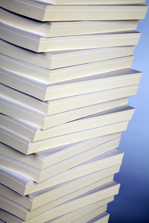 Stack of books on blue