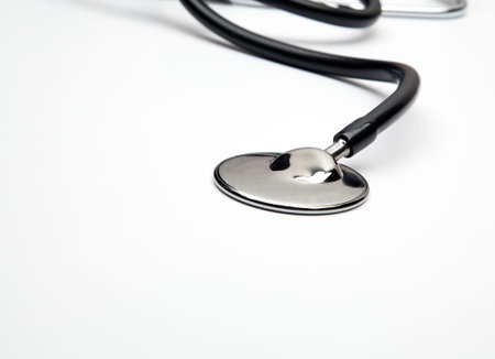 Detail of stethoscope or phonendoscope isolated on white (with space for your logo or text)