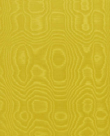 Background of yellow silk (moire)の写真素材