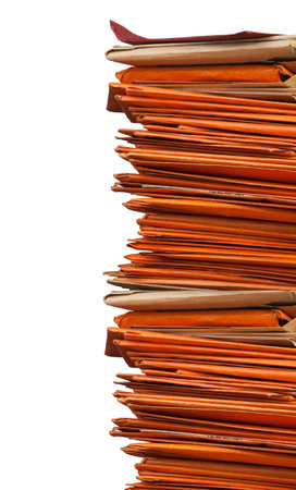 Stack of orange and old folders or envelopes
